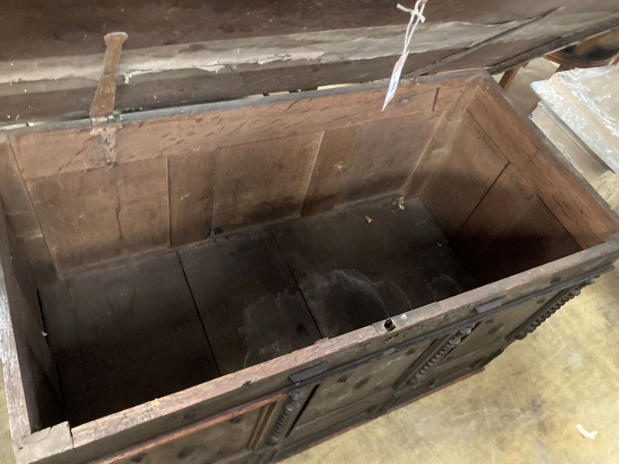 An 18th century panelled oak mule chest, length 117cm, depth 56cm, height 70cm